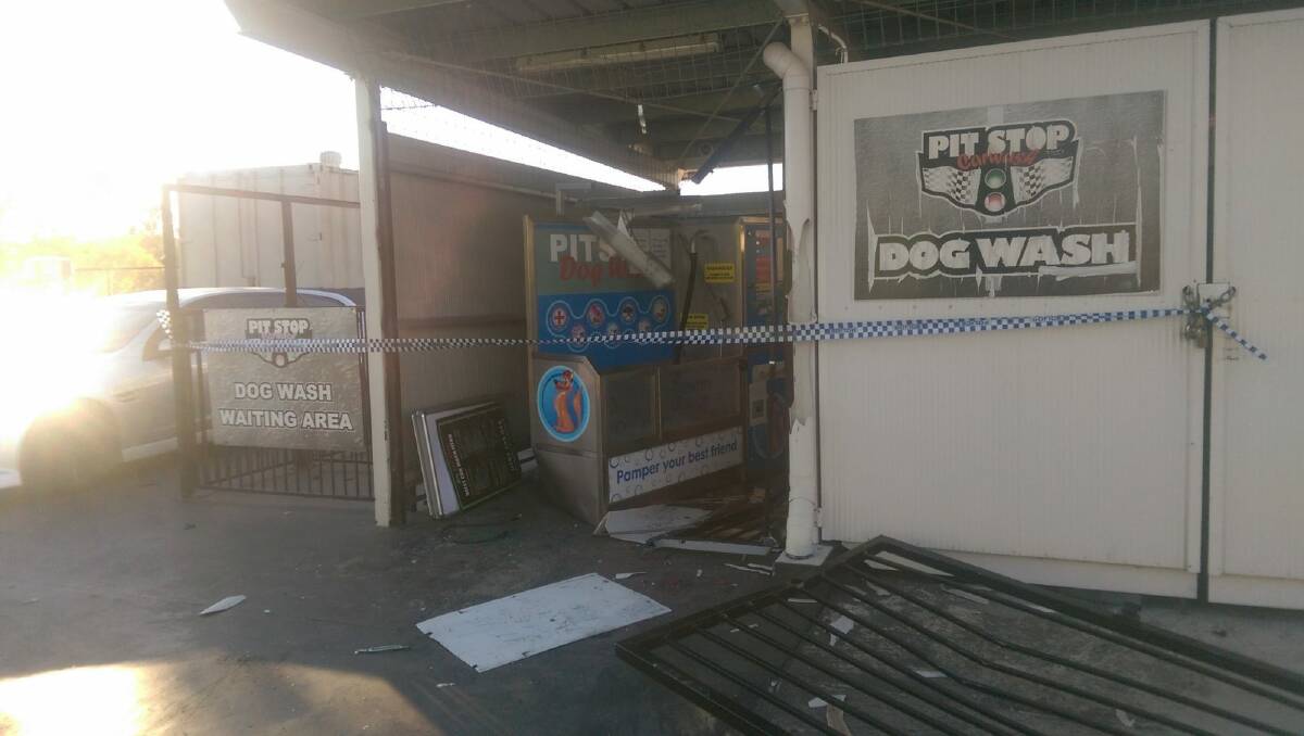 The scene of a failed ram raid at Calwell Shopping Centre. Thieves tried to steal a dog washing machine. Photo: Supplied