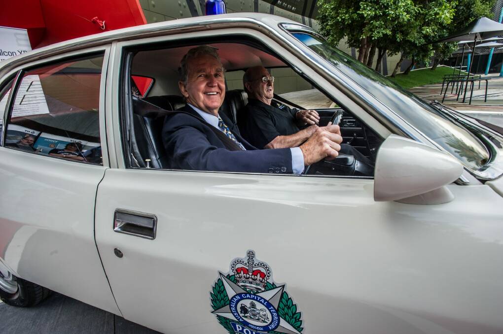 A 1974 pursuit vehicle, Ford Falcon XB 351. The last official driver of the car former Station Sergeant John Hillier and former Senior Sergeant Bill Mackey get behind the wheel for old times sake. Photo: Karleen Minney