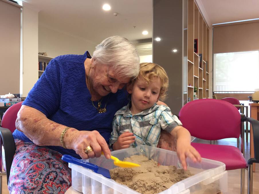 Judy Baker with Archie Tunningley, 3, at the Intergenerational Playgroup program in Weston. Photo: Andrew Brown