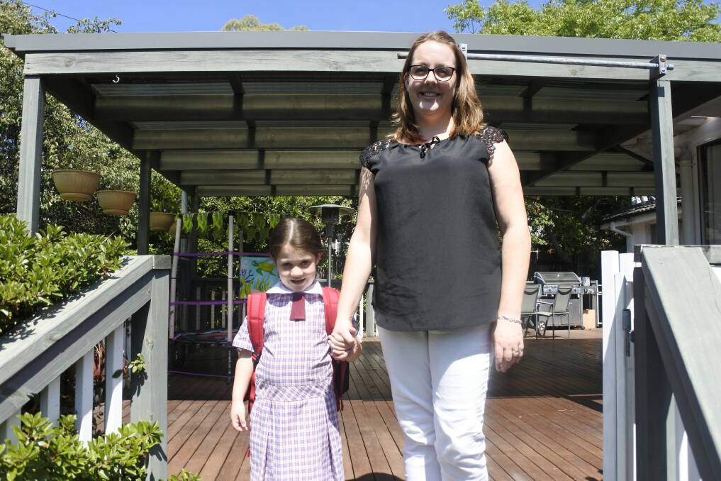 Charlotte Maher, 5, who is starting school this year, pictured with her mum Jennifer. Photo: Andrew Brown
