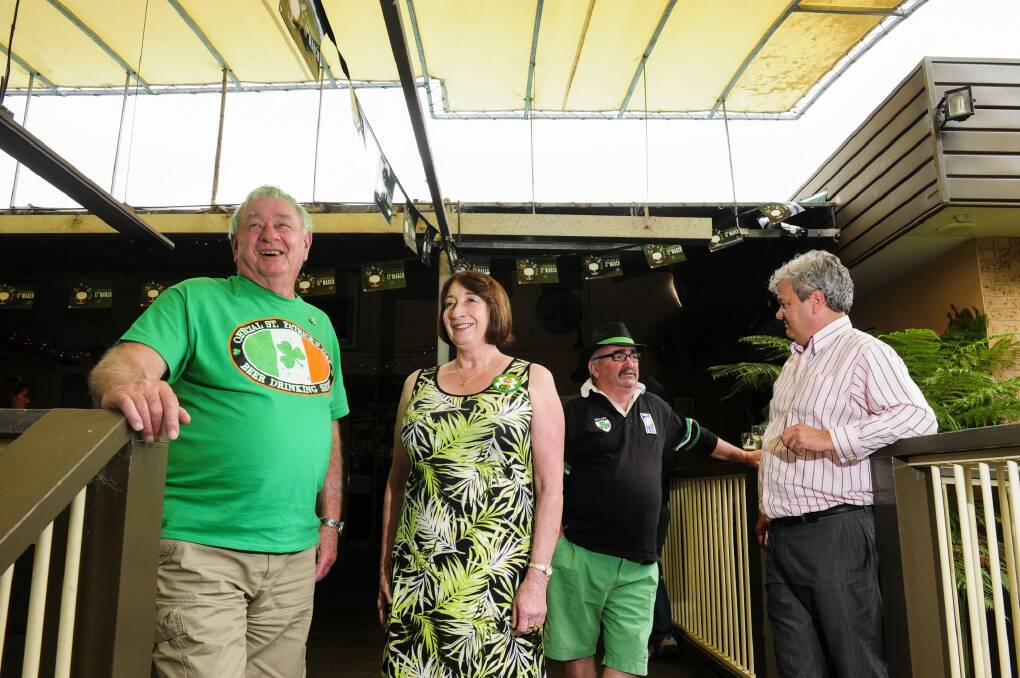 Canberra Irish Club members from left, Joe Lodding of Weston, Mary Keary of Nicholls, Sean Cahill of Monash and president Peter Whelan of Duffy at the club on St Patrick's Day.  Photo: Melissa Adams