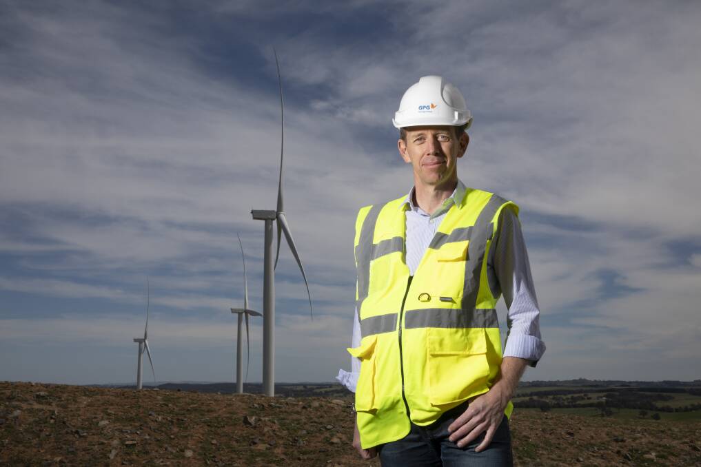Minister for Climate Change and Sustainability Shane Rattenbury, pictured at the Crookwell 2 wind farm, said a peak in electricity prices would stabilise in the 2020s. Photo: Sitthixay Ditthavong