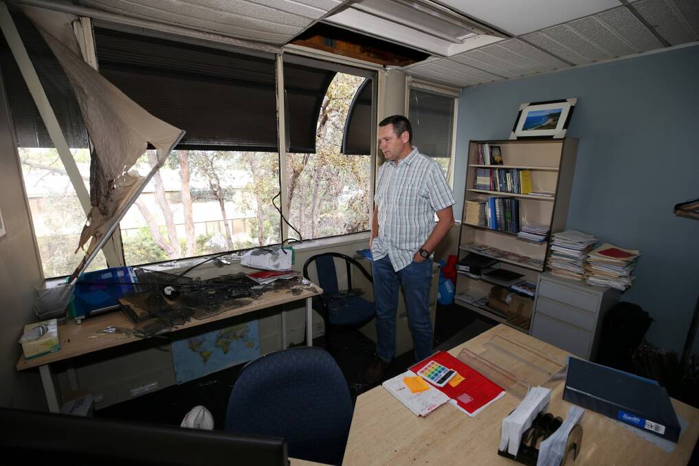 Lyle Shelton, managing director of the Australian Christian Lobby, in the office of his executive assistant after a van with gas bottles exploded outside its office in Canberra in December.  Photo: Andrew Meares