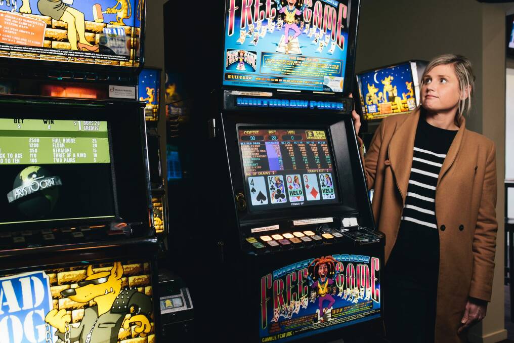 Australian Hotels Association ACT's Jo Broad with aging poker machines at the Statesman Hotel in Curtin. Photo: Rohan Thomson