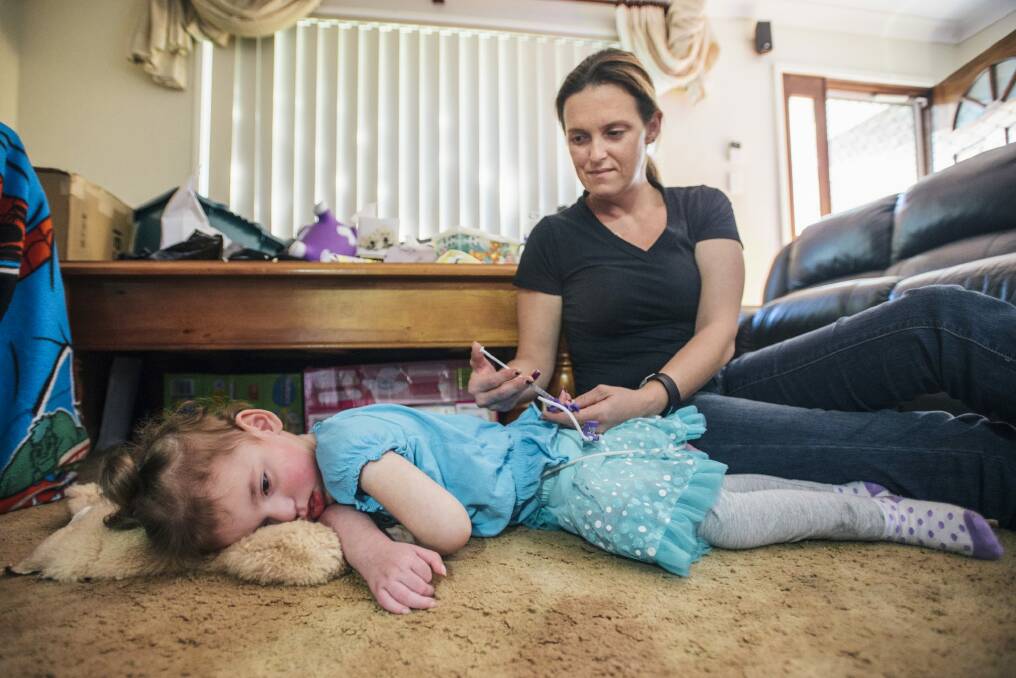 At the home of Cherie and Trevor Dell who treat their 3-year-old daughter Abbey with cannabis oil to treat CDKL5, a rare genetic condition. Photo: Rohan Thomson