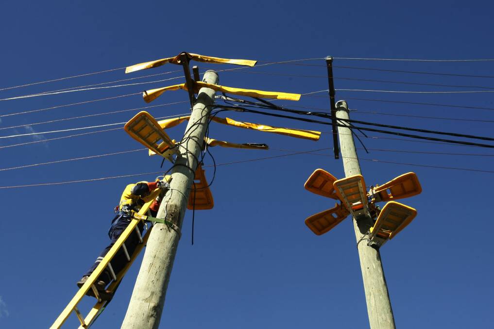 Two Chinese-backed bidders vied for a controlling stake in NSW power distributor Ausgrid. Photo: Louise Kennerley
