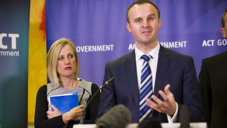 ACT Chief Minister Katy Gallagher watches on as ACT Treasurer Andrew Barr, speaks at the ACT Budget press conference. Photo: Rohan Thomson