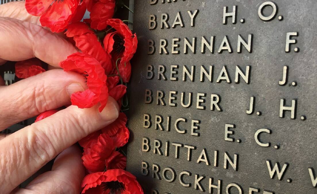 Complete strangers searched for the name of Jack Breuer at the Australian War Memorial. Photo: Australian War Memorial