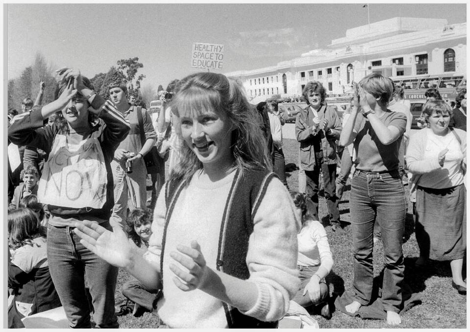 Students from Narrabundah College break into applause outside Parliament House on the September 21, 1983 after they learnt the government was taking action on the presence of asbestos in the school.  Photo: Peter Wells