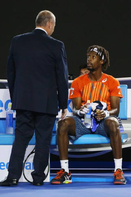 Gael Monfils requests the large screen to be turned off during his quarter-final. Photo: Getty Images
