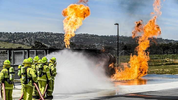 Fire and Rescue College students demonstrate various emergency situations at their graduation. Photo: Rohan Thomson