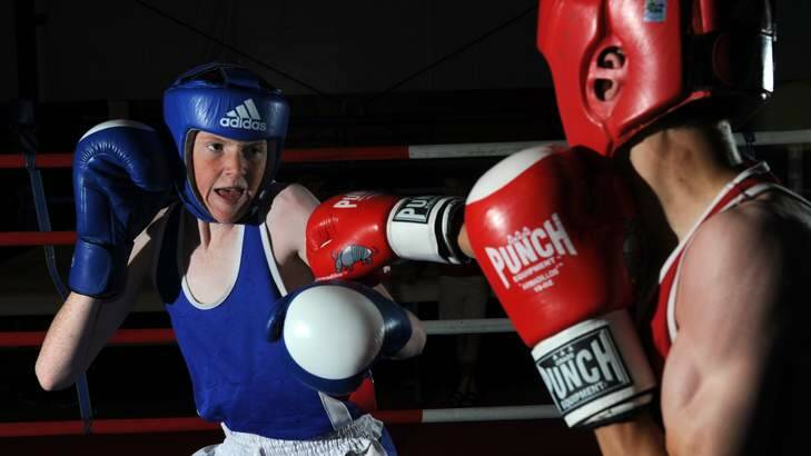 Young boxers Isaac Martin, left, and Adrian Farquhar sparring at the AIS. Photo: Graham Tidy