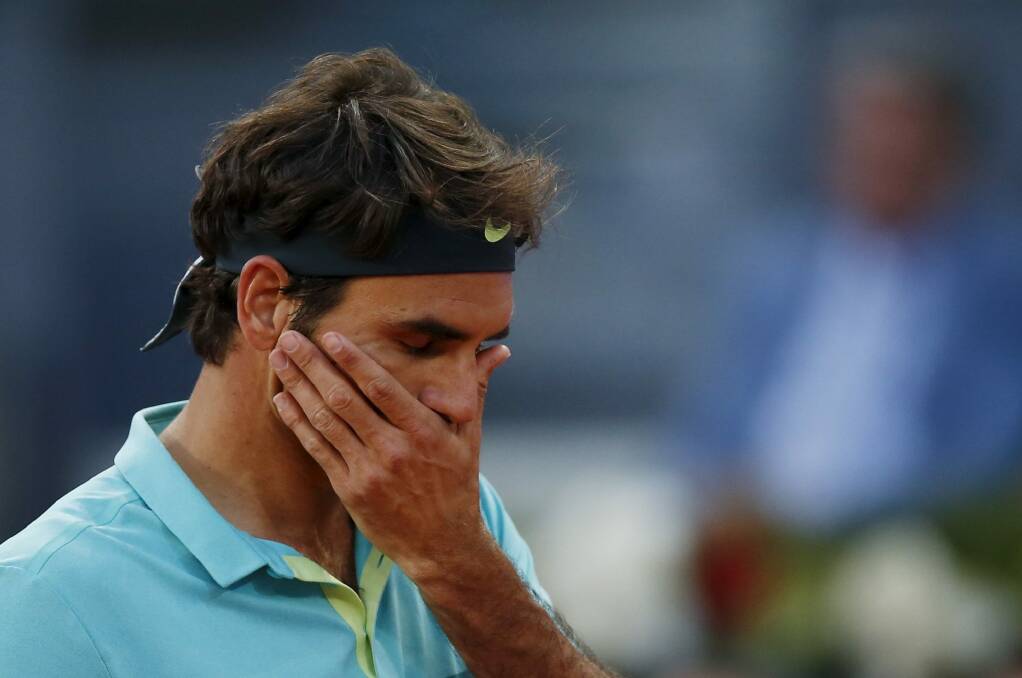 Roger Federer reacts during his match against Nick Kyrgios. Photo: Reuters