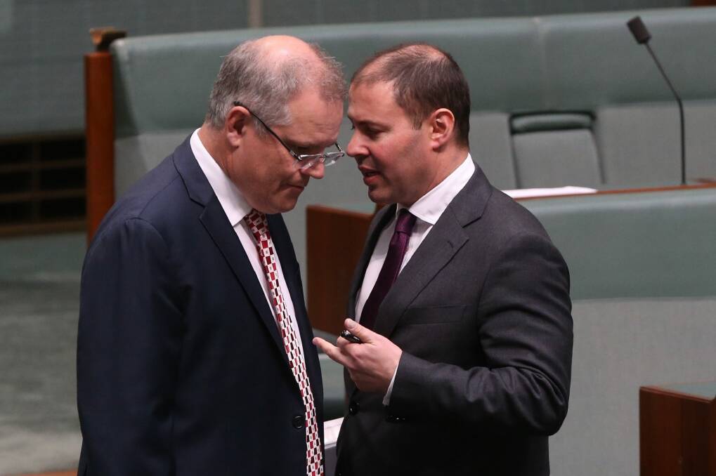 Treasurer Scott Morrison and Resources Minister Josh Frydenberg: The government is reportedly considering major reforms ahead of the budget, including extending a royalty to the offshore projects under a minimum rate of resource tax. Photo: Andrew Meares