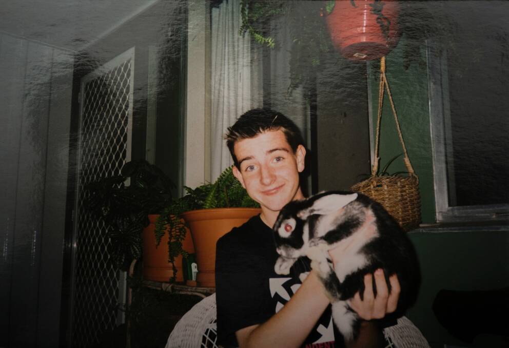 Paul loved animals and rescued his pet rabbits during the Canberra bushfires in 2003. Photo: Rohan Thomson
