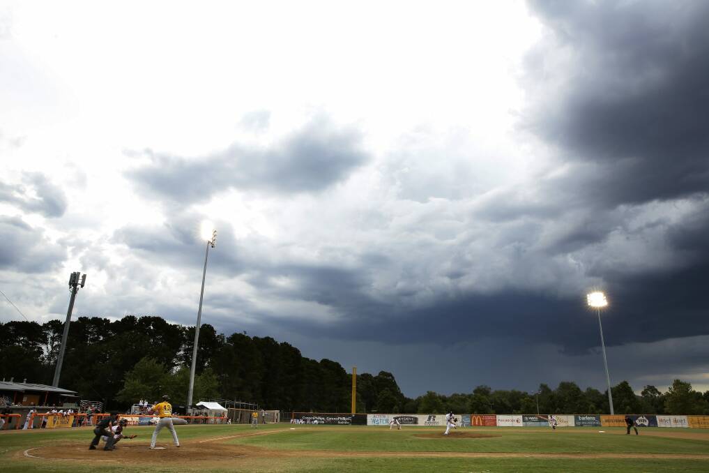 A thunderstorm goes around the Narrabundah Ball Park. Photo: Jeffrey Chan
