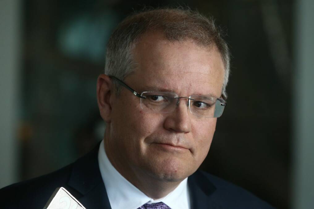Frontbencher Scott Morrison said he rejected Tony Abbott's offer of the Treasurer's role because it would "throw Joe Hockey under a bus".  Photo: Andrew Meares