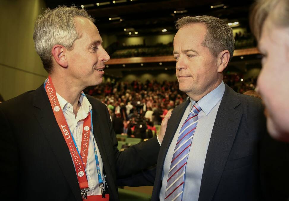Labor MP Andrew Giles with Opposition Leader Bill Shorten at Labor's national conference in 2015 Photo: Alex Ellinghausen
