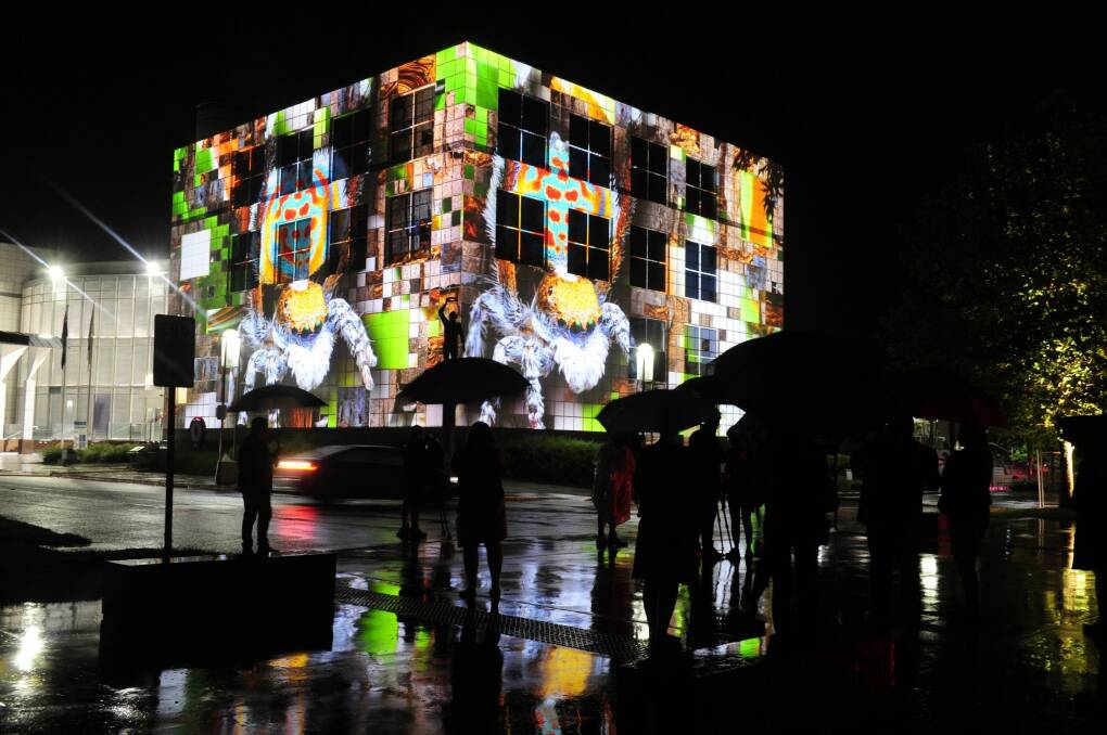 Questacon lights up during Enlighten 2016. The National Science and Technology Centre was won of the winners at the Canberra Region Tourism Awards on Friday night. Photo: Melissa Adams 