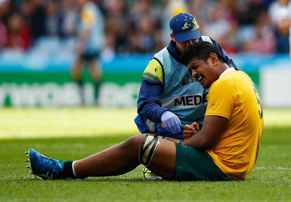 Out for six months: Will Skelton feels the pain against Uruguay. Photo: Getty Images