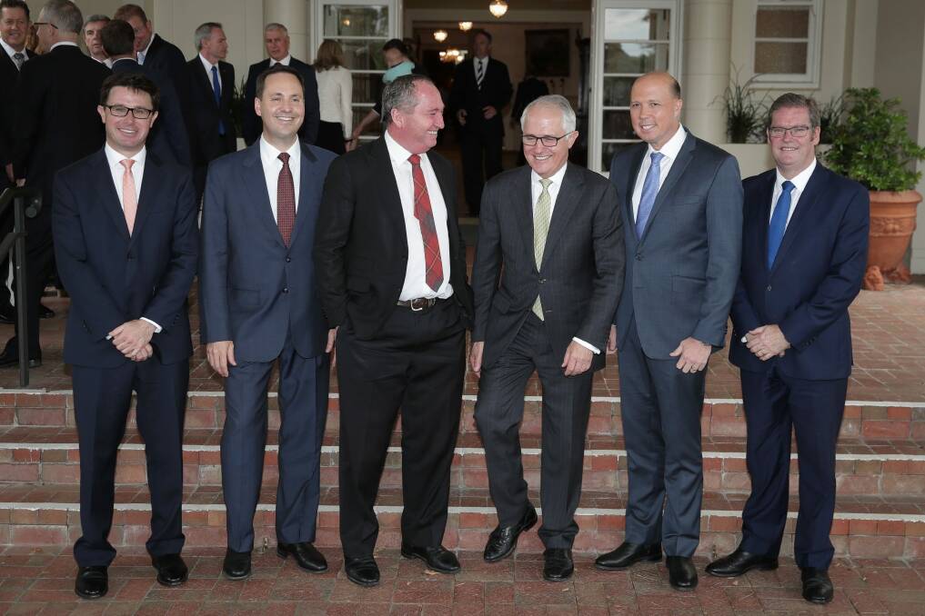 Deputy Prime Minister Barnaby Joyce (centre left) and Prime Minister Malcolm Turnbull (centre right) with the Queensland cabinet team (from left) David Littleproud, Steve Ciobo, Peter Dutton and John McVeigh. Photo: Alex Ellinghausen