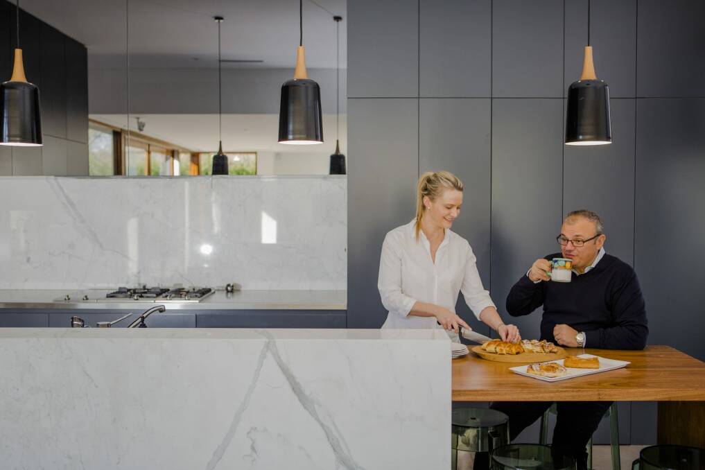 Marissa Christian and Michael Capezio in the kitchen of their renovated Griffith home. Photo: Jamila Toderas