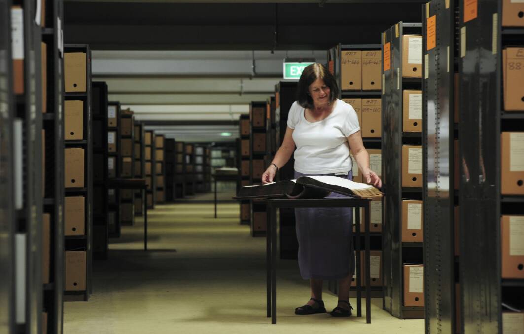 ANU archivist, Maggie Shapley, inside the vast archive building.
 Photo: Graham Tidy