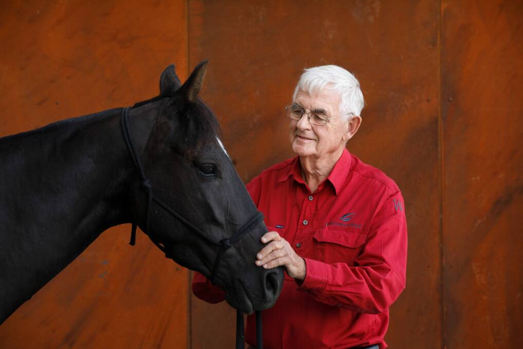Terry Snow with his Australian stock horse Erin: "I'm besotted by horses."  Photo: Sitthixay Ditthavong