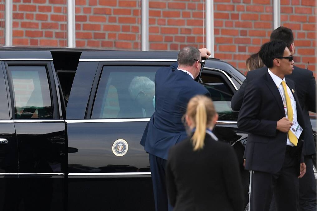 Australian Prime Minister Malcolm Turnbull can be seen entering US President Donald Trump's car, known as the 'Beast' in Hamburg  on Friday. Photo: AAP