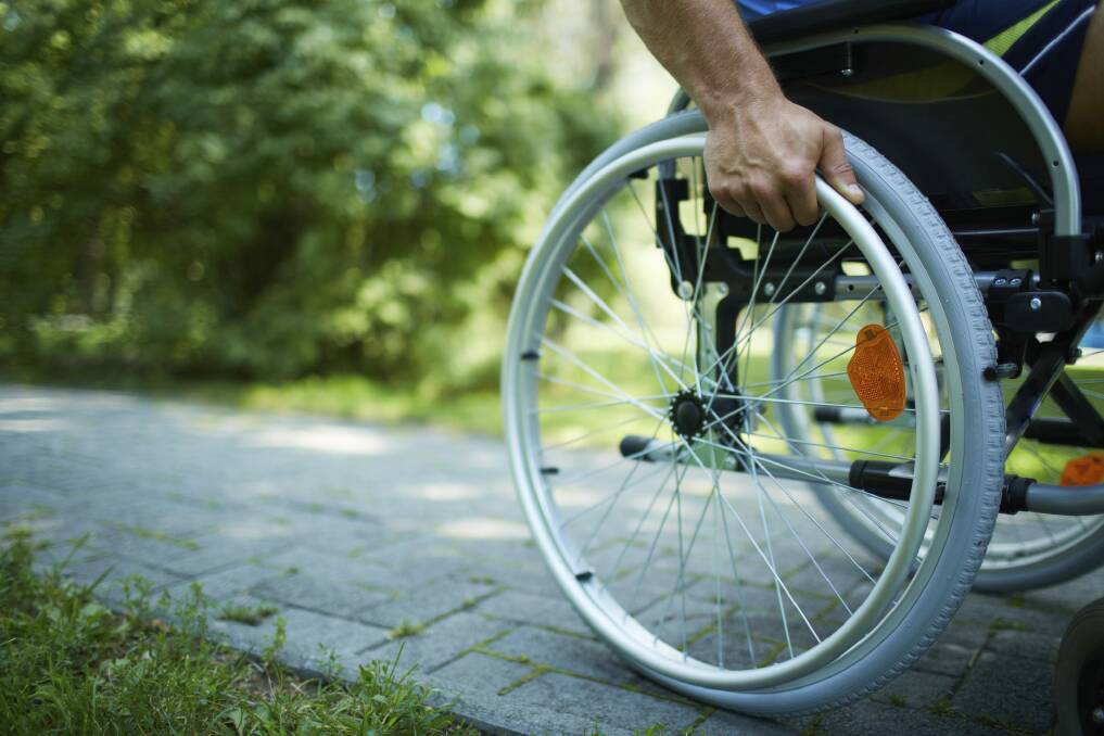 The National Disability Insurance Scheme roll-out is running behind schedule in the ACT. Photo: Canberra Times