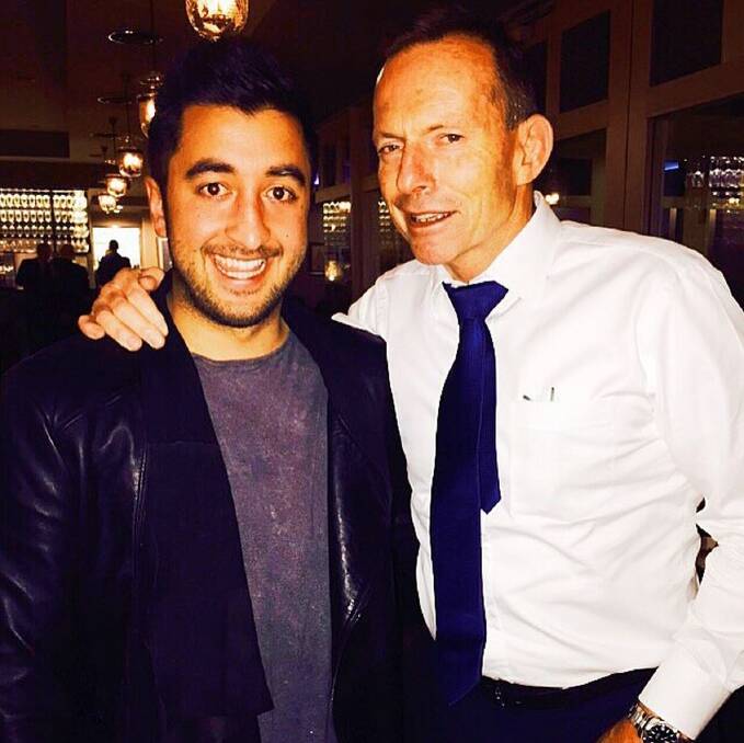 Tony Abbott with Big Brother contestant Jason Roses at a Canberra restaurant on Thursday night. Photo: Brittany Ruppert