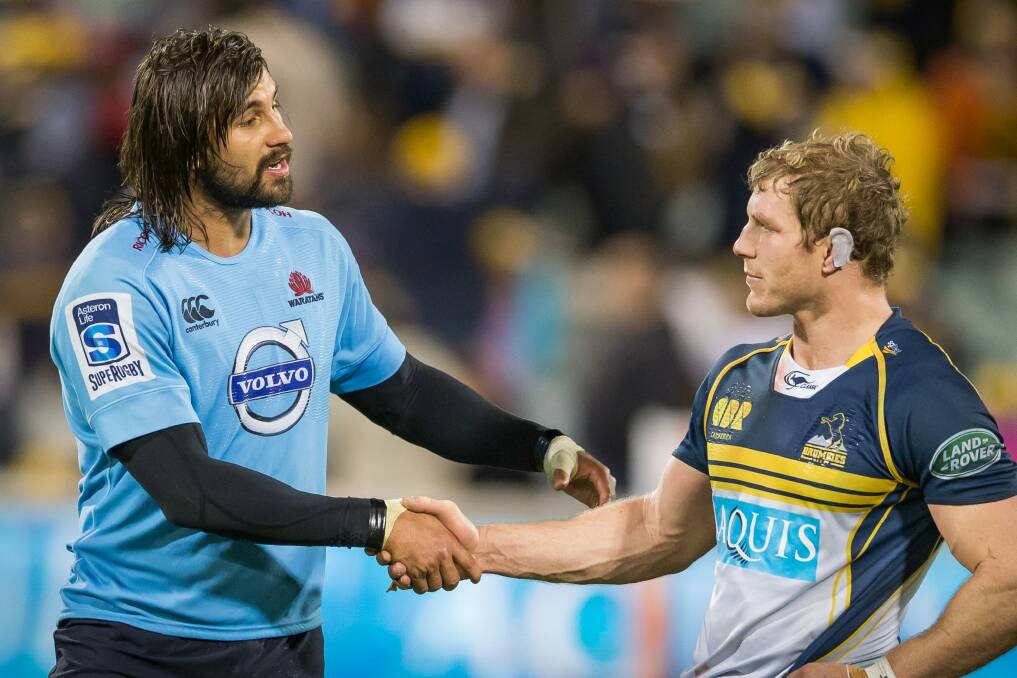 Jacques Potgieter and David Pocock shake hands after the Waratahs beat the Brumbies. Photo: Matt Bedford
