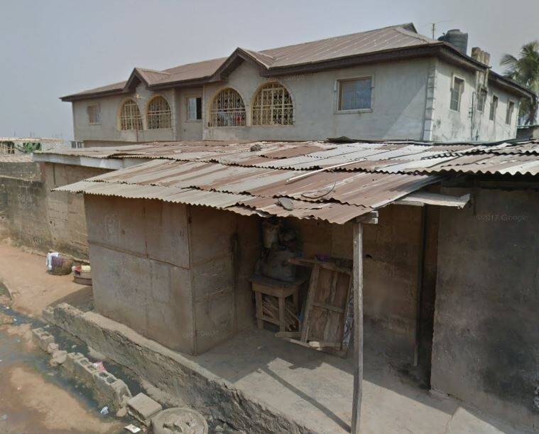 This shack on the outskirts of Lagos, Nigeria, is listed as the headquarters of Joseph Tobore's oil trading business. Photo: Steven Trask