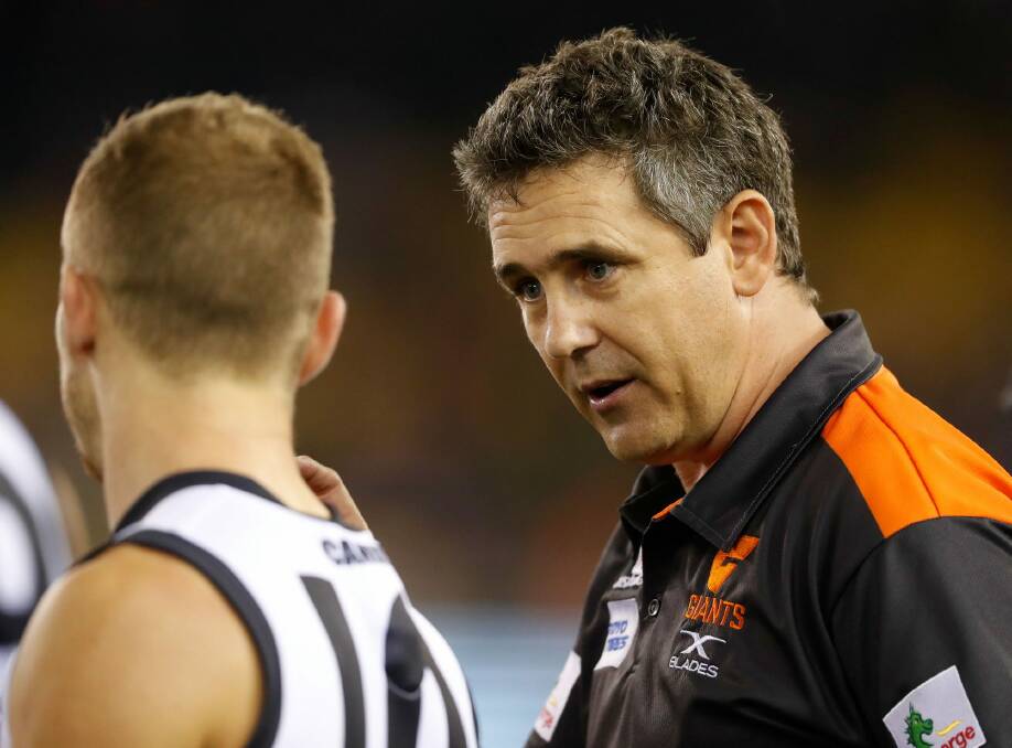 Skeleton crew: Leon Cameron chats to Devon Smith. The coach is philosophical about the loss of key players to injury. Photo: Getty Images