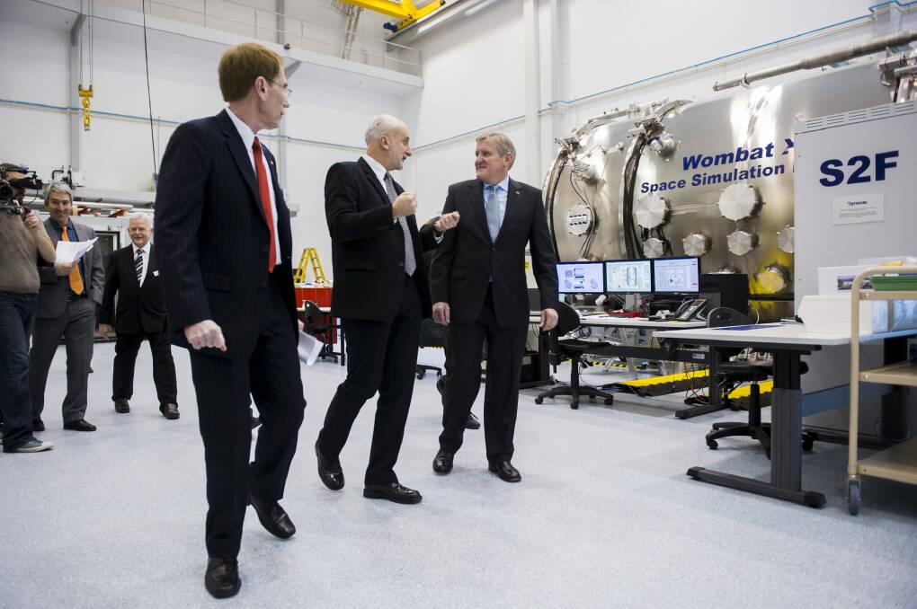 ANU Vice-Chancellor Professor Ian Young, Director of the Research School of Astronomy Professor Matthew Colless, and Minister for Industry Ian Macfarlane at the unveiling of the space engineering facility at the ANU at Mount Stromlo. Photo: Rohan Thomson