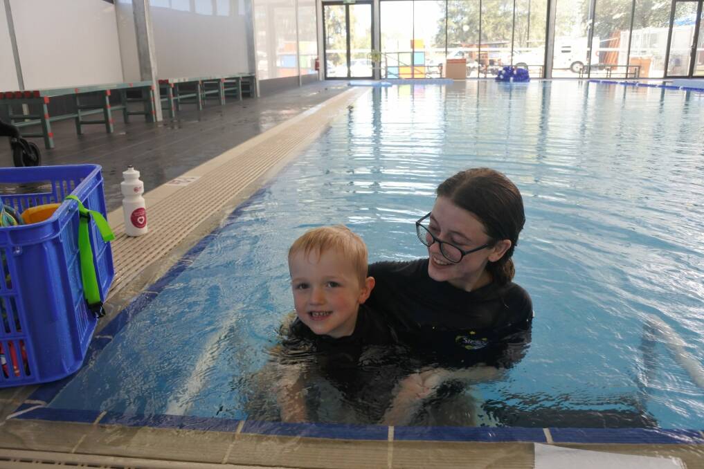 Patrick Thomas, 4, of Monash with swimming instructor Victoria Flood at the Southern Cross Club's new gym.  Photo: Megan Doherty