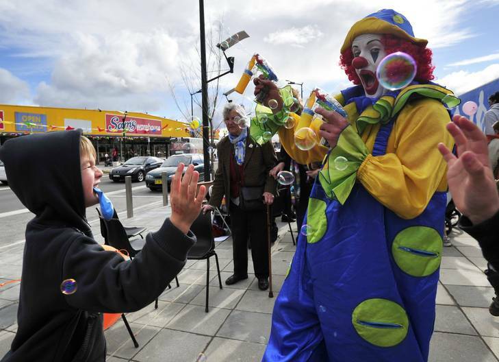 Milo the clown entertains children at the opening of the Crawford Street Lifestyle Precinct in Queanbeyan. Photo: Jay Cronan