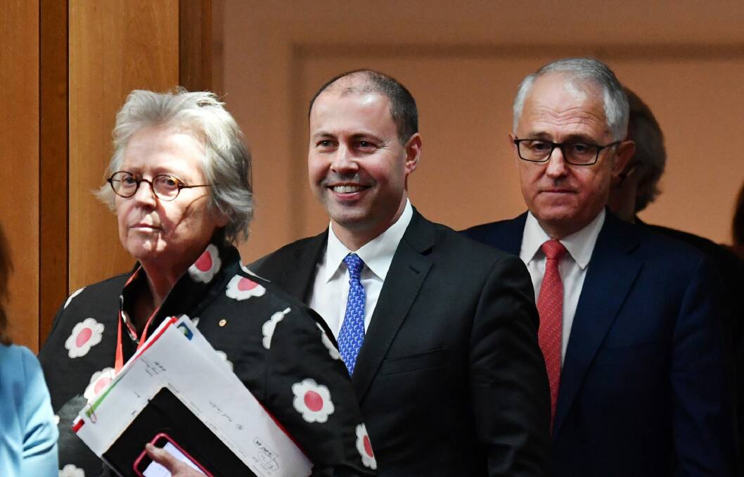 Kerrie Schott, Josh Frydenberg and Malcolm Turnbull at the release of the federal government's National Energy Guarantee. Photo: AAP