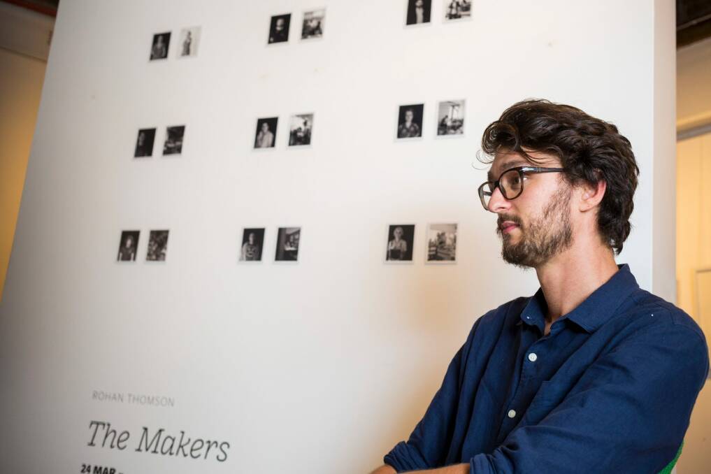 20170322: Portrait of photographer Rohan Thomson in his exhibition 'The Makers', a selection of 52 Polaroid photographs of Canberra artists. 'The Makers' is on show at The Photography Room at The Old Bus Depot markets in Kingston, opening on Friday 24 March and continuing until 30 April. Photo: Sean Davey