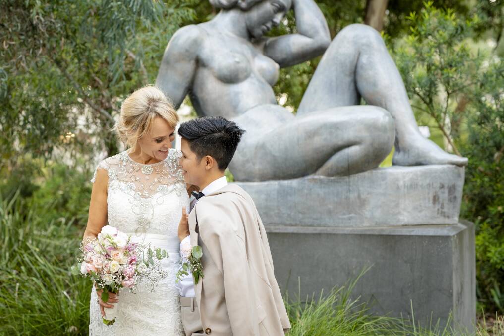 Love and art came together for the wedding of Bella Insch and Mhera Nelson-Insch in the sculpture garden at the NGA. Photo: Katie Phillips