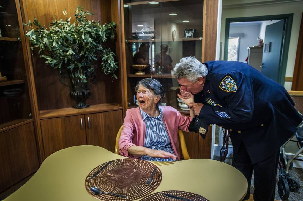 Uniting Care Mirinjani retirement village has granted a lifelong wish for resident Berenice Benson to meet a real New York city cop. Photo by Karleen Minney. Photo: karleen minney