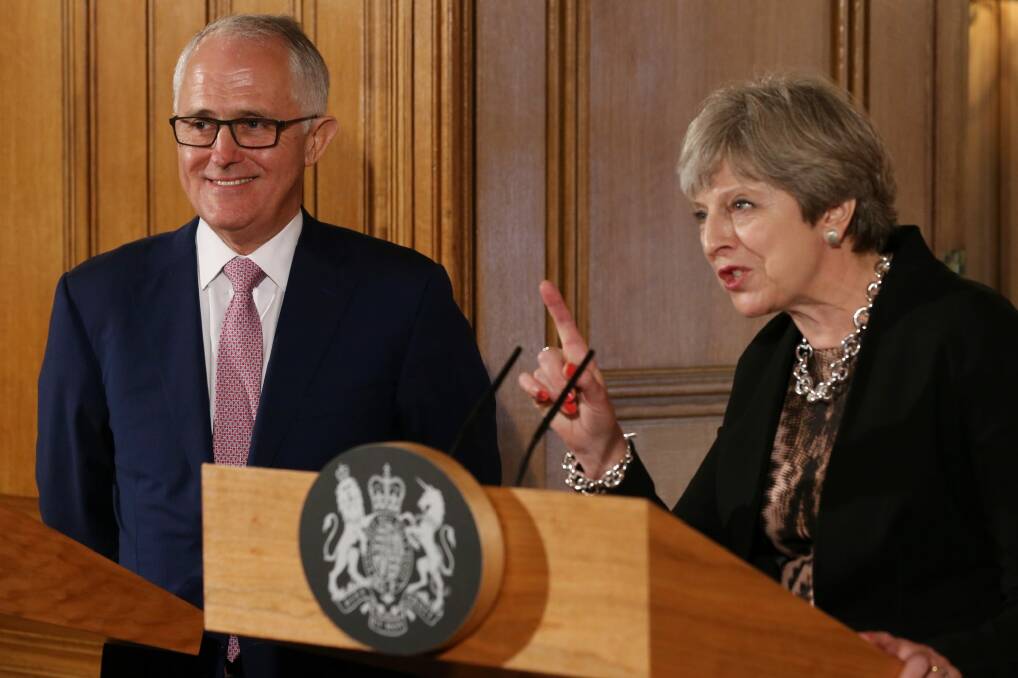 Theresa May holds a press conference with Malcolm Turnbull at Downing Street. Photo: Andrew Meares