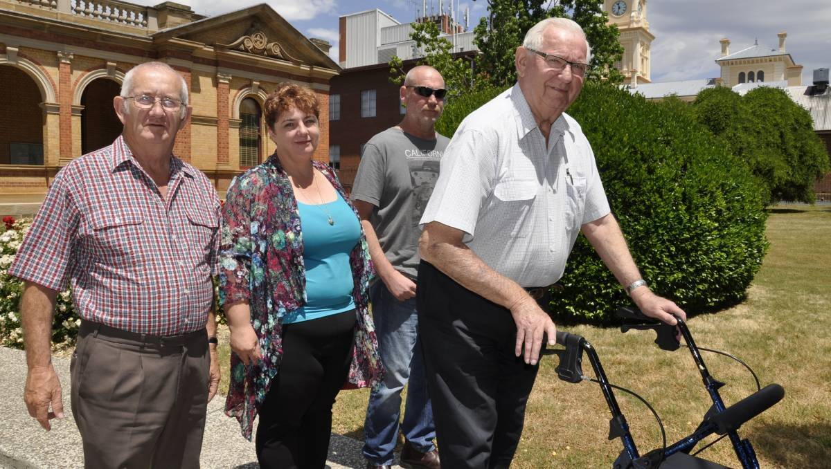 James Hughes' father Colin (right), brother Peter (second right), James's partner, Melissa Pearce and her father, Ron leave Goulburn courthouse on Wednesday, following the inquest's first session. Photo: Goulburn Post