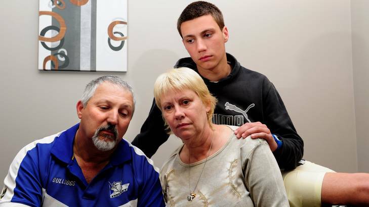 Kay Catanzariti, her son Jack and husband Barney in Canberra to plead for better worker safety. Kay's son Ben died on a Kingston building site earlier this year. Photo: Melissa Adams 