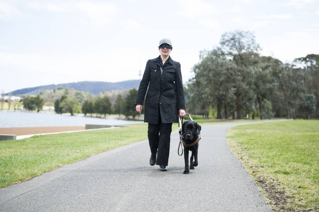 Jo Weir with her guide dog Wiley Photo: Dion Georgopoulos