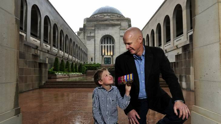 Jon Howse pictured with his grandson Ben Ianniello, 8, of Red Hill at the Australian War Memorial, Canberra. Photo: Melissa Adams