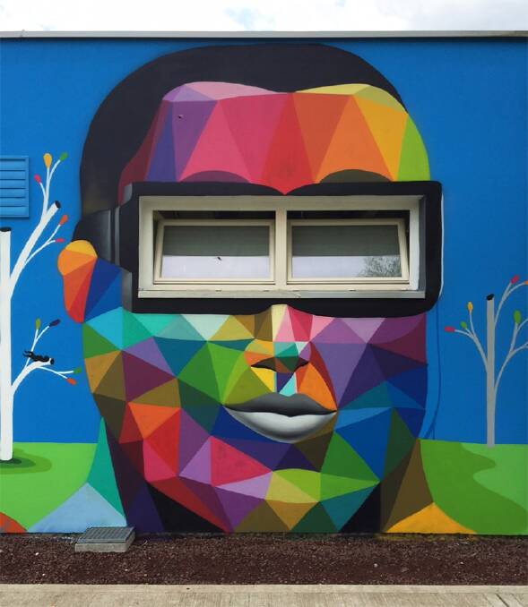 Okuda San Miguel's street art face with windows as eyes.  Photo: Okuda San Miguel.