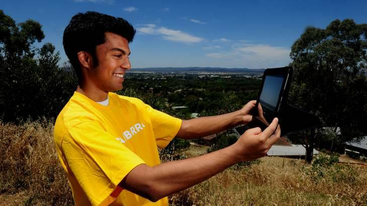 Chanuka Perera, 20, at Rocky Knob, near Narrabundah, his choice for the Like Canberra campaign. Photo: Melissa Adams