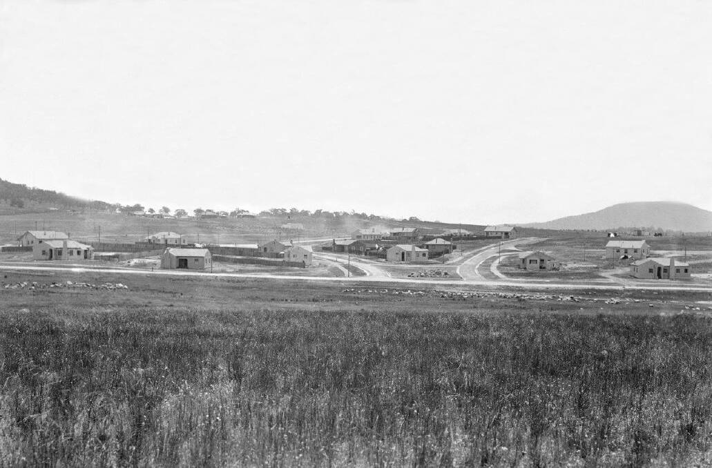 Old photo of Flinders Way and Houses near Monaro Crescent, Red Hill. Note: The rocks at the Red Hill Camp are in a vacant block in front of a house at centre.  Photo: Mildenhall Collection NAA- A3560, 7616 1926
