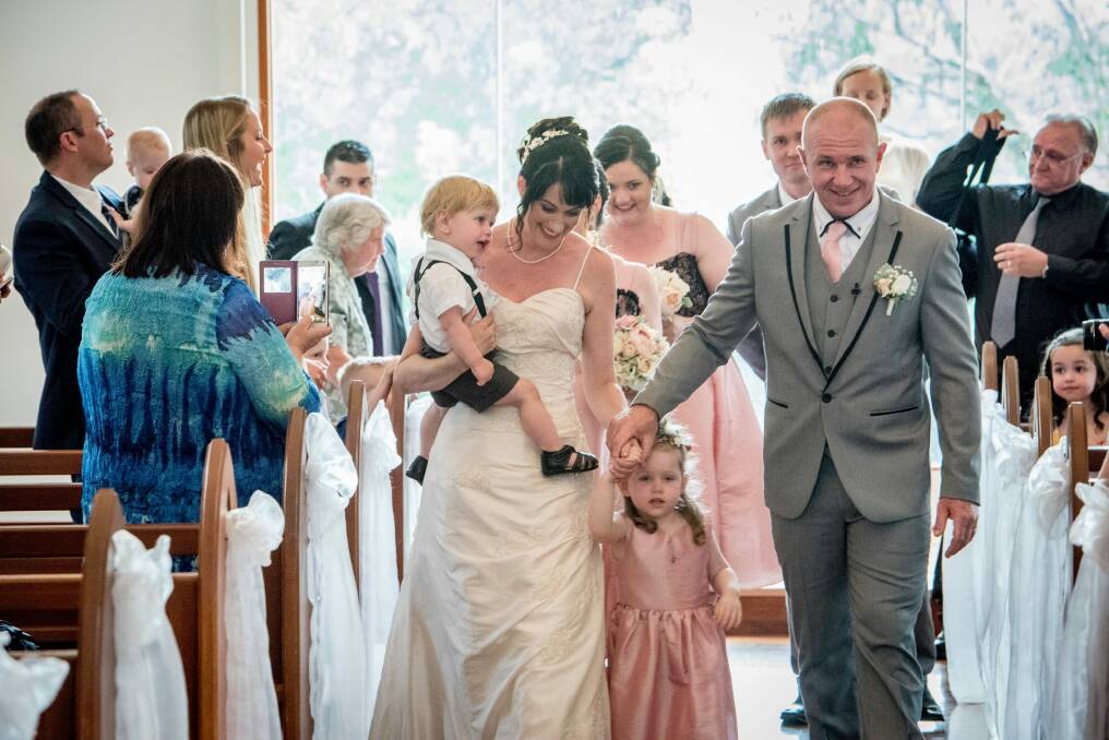 It was a day of joy for young Annabelle, her little brother William and her parents Kathie and Adam. Photo: Mark Jennaway, Timeless Creations